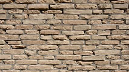 Fototapeta premium Old stone wall with exposed bricks and mortar details, stone texture, natural materials, wall decoration