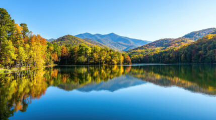 Naklejka premium Idyllic mountain view with rich forest colors reflected in calm lake