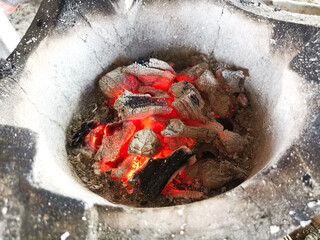 Obraz premium prepare the charcoal for grilling in the kitchen