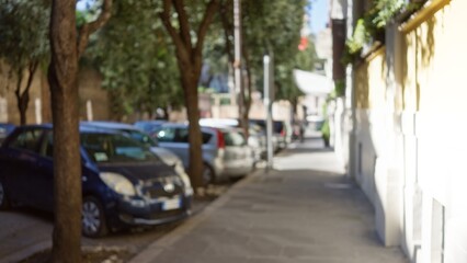 Blurred street scene in rome with cars, trees, and old buildings creating a vivid bokeh effect, showcasing italy's urban charm and historic outdoor atmosphere.