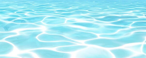 Fototapeta premium A serene surface of clear, shimmering blue water, reflecting light and creating gentle ripples, evoking a sense of calm and tranquility.
