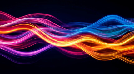 Vibrant colorful waves of light on a dark background showcasing energy and motion