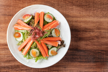 Mixed Greens Salad with Crab Sticks.