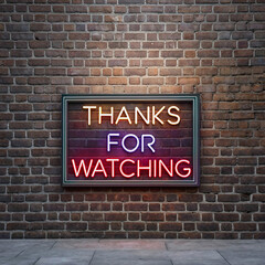 Fototapeta premium A vibrant neon sign reading 'THANKS FOR WATCHING' glows against a rustic brick wall, creating a striking visual contrast.