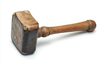 Antique wooden mallet with worn head and handle. Ideal for projects depicting craftsmanship, history, or DIY themes.