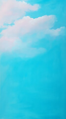 Soft pastel clouds float in serene blue sky