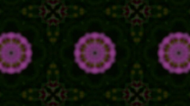 Pattern of flowers in a green background. The flowers are purple and the background is dark