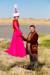 Kazakh woman and man in national costumes