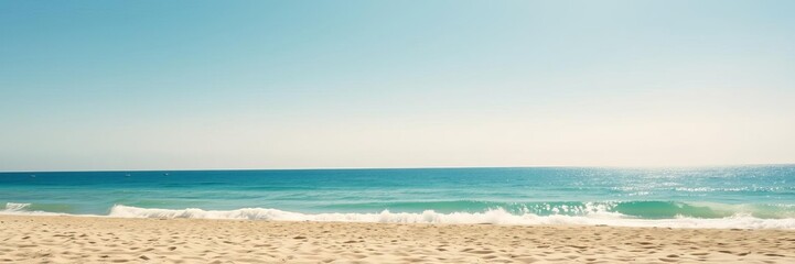 Fototapeta premium Serenity landscape of sandy beach with gentle waves and clear blue sky, tranquil, outdoors, beach
