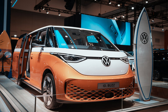NOVEMBER 27, 2024, ICE BSD, GAIKINDO JAKARTA AUTO WEEK. Portrait of the Bright Orange Volkswagen ID. Buzz Electric Car Exhibited at the Indoor Automotive Exhibition. The car looks modern with an aerod