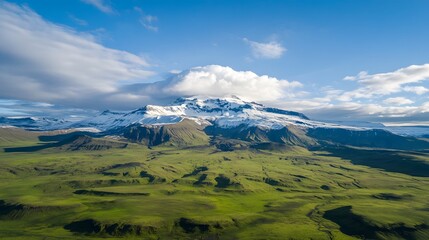 Naklejka premium Lush green landscape with dramatic clouds, vibrant hills stretching into the distance, perfect for nature-themed projects.