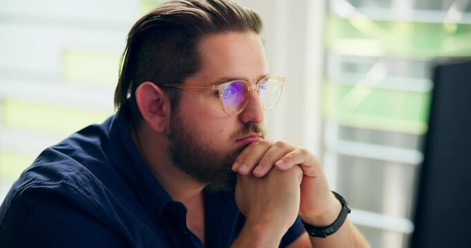 Business, man and thinking in office with computer for risk assessment, finance decision or compliance verification. Auditor, person or problem solving with online financial statement or fraud report