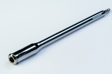 A single pen resting on a clean white surface