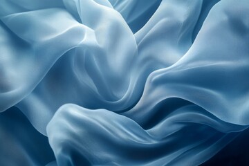 Obraz premium Blue silk fabric drapes, studio shot, flowing waves, dark background, textile design