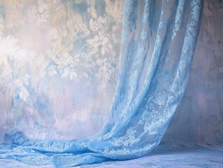 Elegant Baby Blue Lace Fabric Drape Against a Floral Background