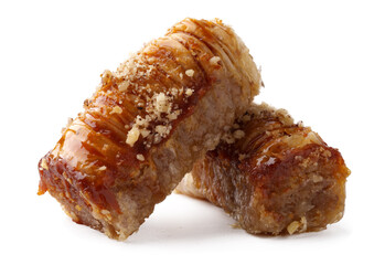 Savory meat rolls with a sweet glaze and crunchy topping served for a delicious meal