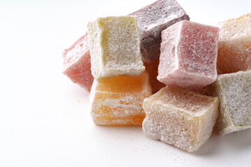 Colorful and delightful chewy candies displayed on a white background showcasing their unique textures and flavors