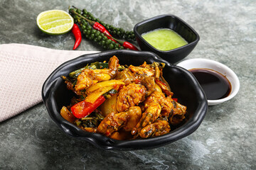 Vietnamese cuisine - fried frog with vegetables