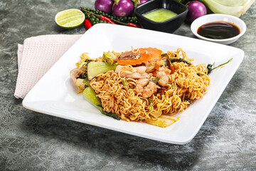 Asian cuisine - Fried noodles with seafood