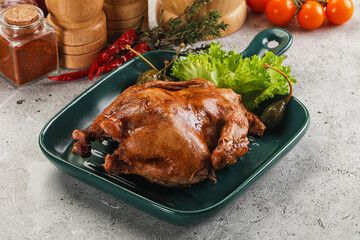Baked small chicken with spices