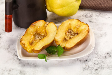 Baked quince with honey and cedar