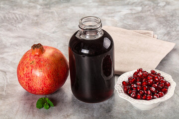 Sweet fresh pomegranate juice with fruit