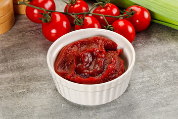 Red tomato paste in the bowl