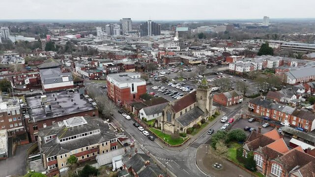 Basingstoke town centre England pull back drone aerial reverse reveal