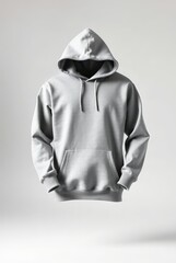 gray hoodie with a hood and kangaroo pocket. The hoodie is on a gray background and the sleeves are rolled up. Generative AI