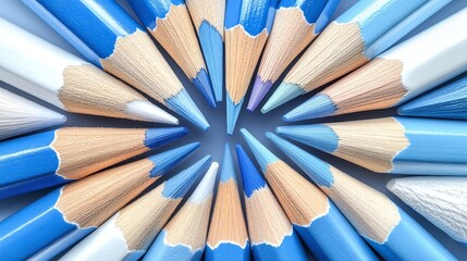 Fototapeta premium Vibrant circular arrangement of blue colored pencils for artistic inspiration