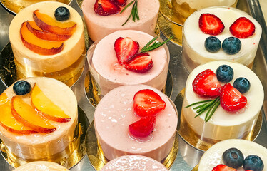 desserts in a candy store are prepared in an elegant style and covered with transparent glaze