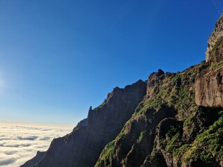 Rugged landscape of Madeira, featuring deep valleys and steep cliffs, hike from pico do arieiro to pico ruivo
