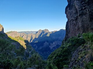 Rugged landscape of Madeira, featuring deep valleys and steep cliffs, hike from pico do arieiro to pico ruivo