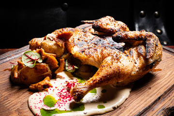 Savory Roasted Chicken With Flavorful Accompaniments Served on a Rustic Wooden Platter in an Elegant Dining Setting Capturing Culinary Artistry at Its Best