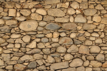 yellow beige sand color stone brick vertical wall