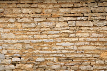 yellow beige sand color stone brick vertical wall