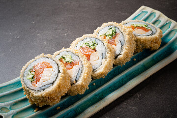 Exquisite Sushi Rolls Crafted With Fresh Ingredients on a Vibrant Plate Showcasing Culinary Artistry in a Modern Dining Setting