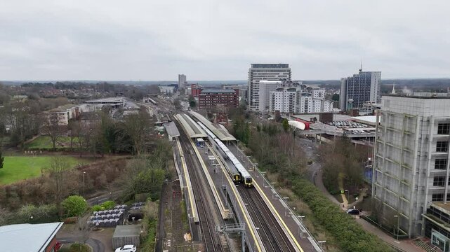 Two trains leaving Basingstoke station drone tracking
