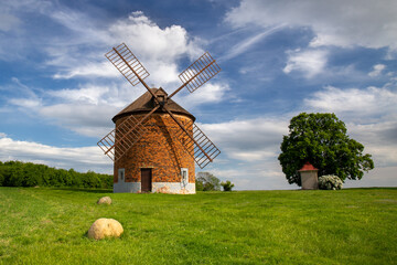 Chvalkovice windmill surrounded by rolling farmland. Moravia, Czech Republic.