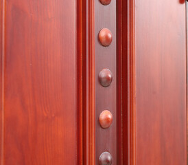 Obraz premium wooden door plugs made of mahogany