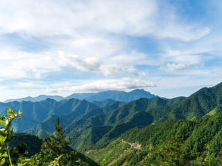 mountain landscape with blue sky and clouds