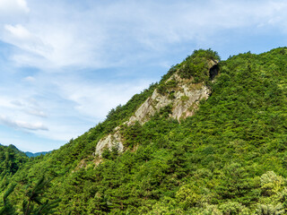 mountain landscape with blue sky and clouds