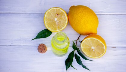 lemon oil in jars, fresh lemon. Selective focus. Nature