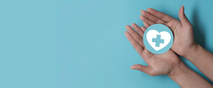 Health insurance concept. Health care checkup and healthy trends. Access to welfare health. Wellness and medical. Wood cube and healthcare insurance icon on pastel blue background. World health day