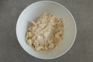 Flour and butter pieces mixed together.