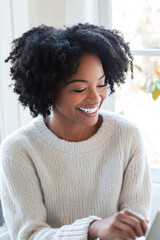 Fototapeta premium Smiling African American Woman Engaged in Research and Keyword Exploration at Home