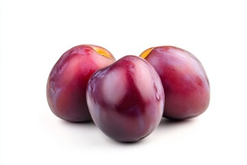 Obraz premium Three ripe red plums isolated on white background.