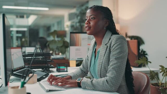 Paperwork, typing and black woman on computer in office as business intelligence analyst. Technology, research document or working for finance, investment report or reading charts for data comparison