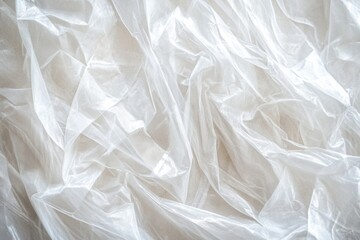 Obraz premium A close-up of crinkled transparent cellophane plastic with sharp