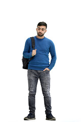 Fototapeta premium A man, full-length, on a white background, with a backpack